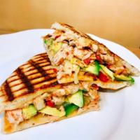 P12. Chicken Veracruz Panini · Grilled chicken with salsa sauce, bell pepper, onion, Pepper Jack cheese, and avocado on Eur...