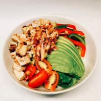 Grilled Chicken Salad · Grilled chicken, avocado, bacon, bell pepper, grape tomato, and romaine lettuce.