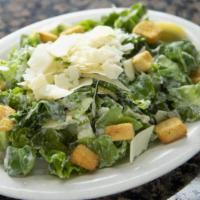 Caesar Salad · Romaine lettuce, housemade croutons, parmesan cheese, lemon, and Caesar dressing.
