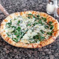 Bianco Pizza · Prepared with Alfredo sauce, fresh garlic, spinach, Parmesan, and baked with a golden sesame...