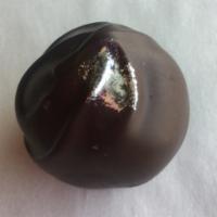 Champagne Dark Chocolate · Belgian dark chocolate ganache infused with champagne flavoring and dipped in Belgian dark c...