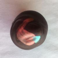 Cayenne · Dark Belgian chocolate ganache infused with red cayenne pepper dipped in dark Belgian chocol...
