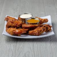Sal's Birdland Seasoned Jumbo Wings - 10 Piece · 10 piece wing order served with 1 each of Sal's 3.25 oz. cup or Sal's sassy sauce and Sal's ...