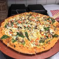 Spinach and Artichoke Pizza · Spinach and artichoke mix, garlic sauce, mozzarella cheese, fresh mushrooms, onions, fresh t...