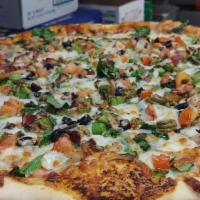 Vegetarian Pizza · Choose from or red tomato sauce or garlic sauce. Topped with spinach, mozzarella cheese, fre...