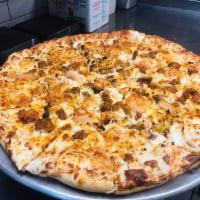 Spicy Cajun Pizza · Alfredo sauce, chicken, shrimp, italian sausage, and drizzled with spicy sauce.