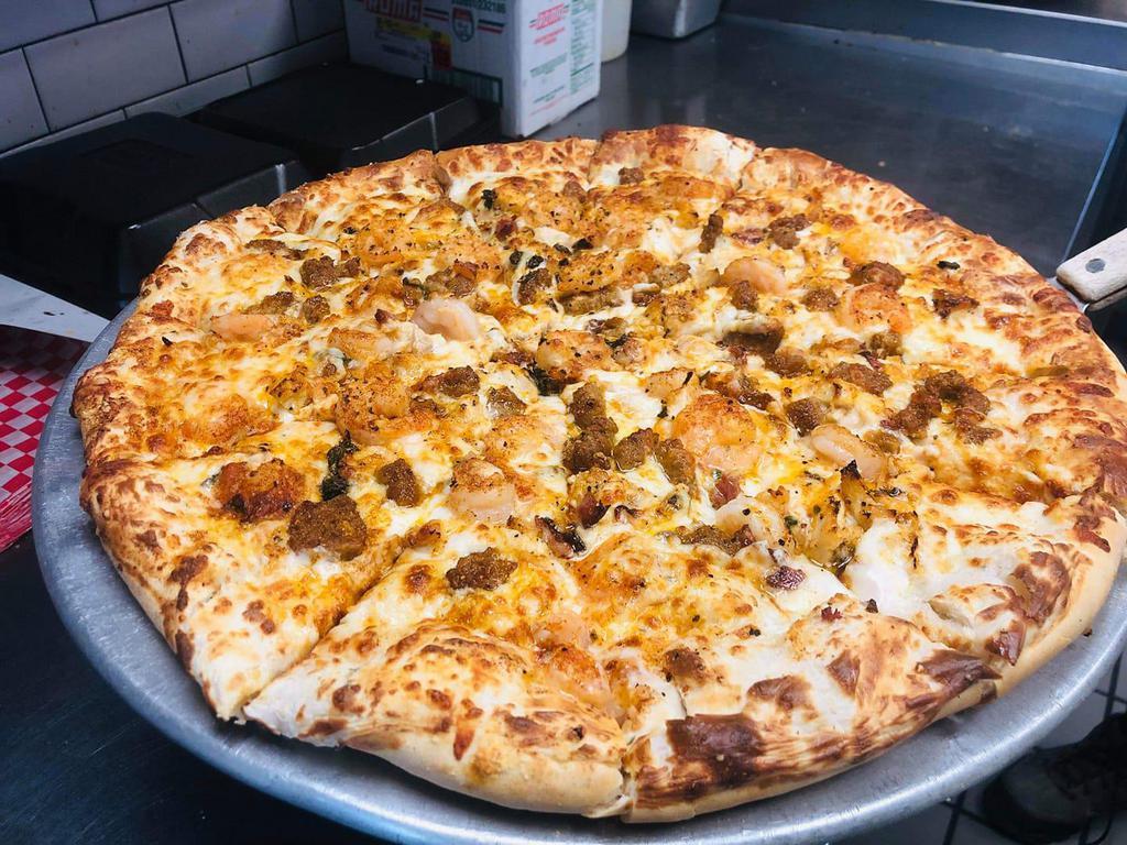 Spicy Cajun Pizza · Alfredo sauce, chicken, shrimp, italian sausage, and drizzled with spicy sauce.