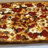Grandma Pizza · Brushed with olive oil and garlic, fresh mozzarella and spotted with mozzarella cheese marin...