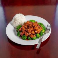 Sesame Chicken · Deep-fried chicken cooked in a sweet sauce with sesame seeds.
