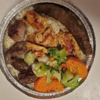Ali Baba Mix Grill · Mixed Beef and Lamb Kofta, Lamb or Beef Cubes and Chicken serviced with Rice or Fries and St...