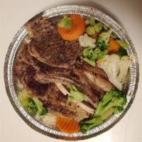 Ali Baba Lamb Chops · Grilled Baby Chops serviced with Rice or Fries and Steamed Vegetables.