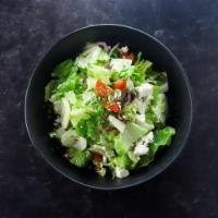 Greek Salad · Ensalada Griega: Cucumber, Tomato, Olives, Feta, Red Onion, Romaine, Red Wine Vinaigrette