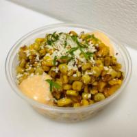 Charred Corn · with Rocoto Aioli, Queso Fresco, and Lime Zest