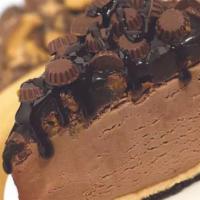 Chocolate Peanut Butter Slice · Peanut butter cups and hot fudge sit atop velvety smooth peanut butter mousse and rich choco...