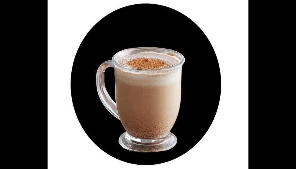 Dirty Chai Latte · Local Coffee Spot is proud to serve our Chai Tea; Black tea infused with warm clove, cardamom, cinnamon and ginger notes. A bold, distinctive, traditional chai tea.
