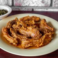 Fried Ribs with 1 Side  · Served with yams, potato salad, baked beans or collard greens.