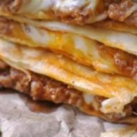 Beef Quesadilla · Beef and cheese in a flour tortilla.