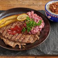 Carne Asada · Grilled steak. Rice, salad and ripe plantain.