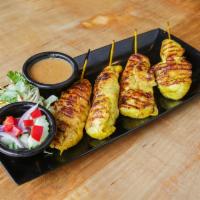 Chicken Satay · 4 pieces. Marinated chicken tenders with Thai-style satay sauce, served with peanut sauce.