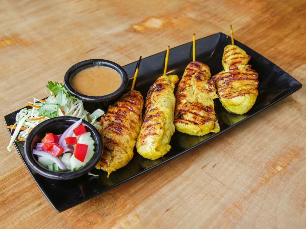 Chicken Satay · 4 pieces. Marinated chicken tenders with Thai-style satay sauce, served with peanut sauce.