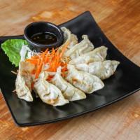 Pot Stickers · 8 pieces. Made with veggies, or chicken and veggies, served with spicy ginger soy sauce.