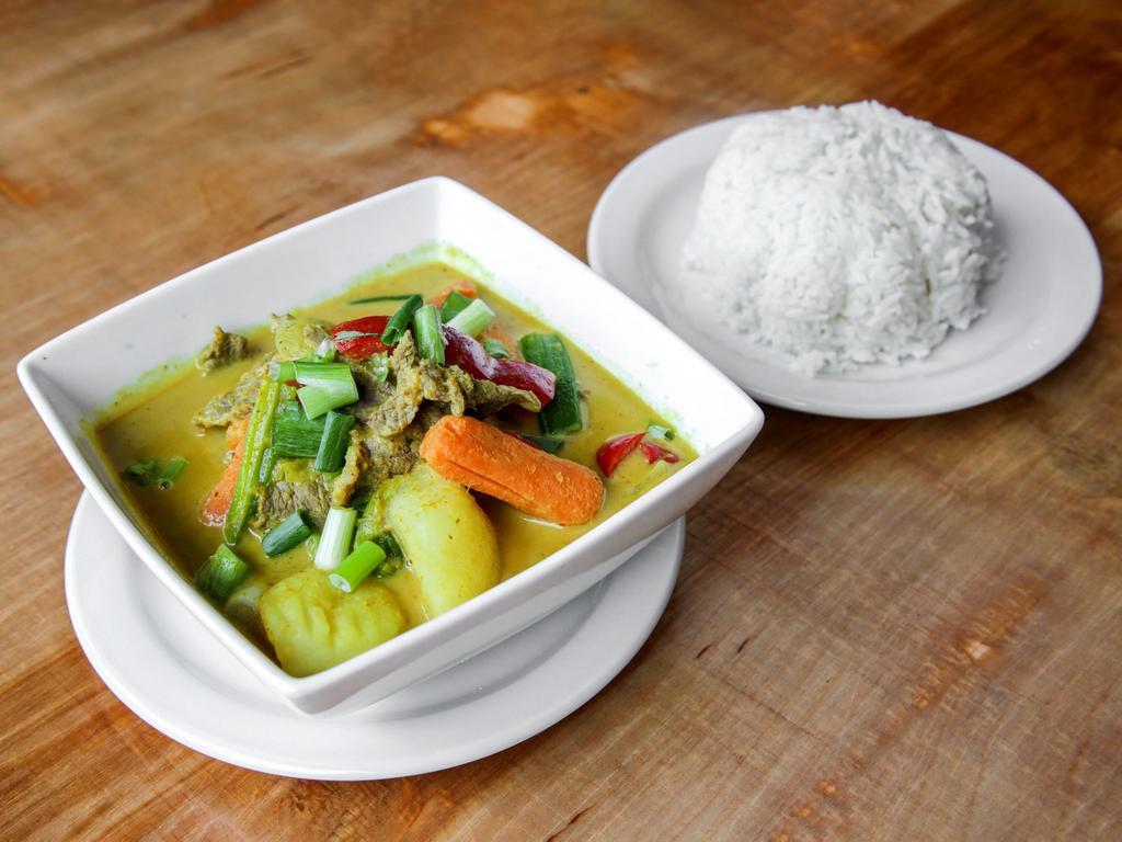 Yellow Curry · Mild spicy yellow curry sauce with potatoes, bell pepper, and carrot.