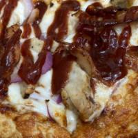 BBQ Chicken Pizza · House-made dough covered in sweet BBQ sauce, savory chicken breast, sweet red onions, crispy...