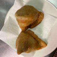 Piece Chicken Samusa ( 2 PCs ).  · A fried pastry with a savory potato filling.