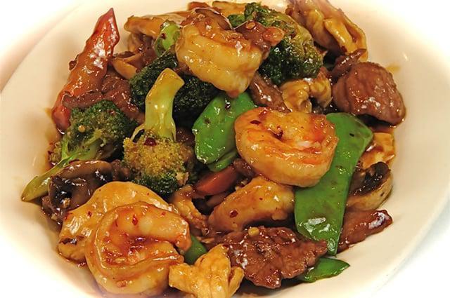 S3. Triple Delight · Fresh shrimp, roast pork, chicken, water chestnuts, bamboo shoots, mushroom and Chinese vegetables in a special sauce.