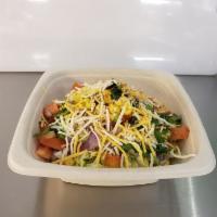 Mexican Bowl · Chicken, organic black beans, salsa, corn, red onion, tomatoes, cheddar jack, lettuce, chipo...