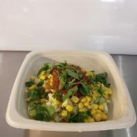 Baja Queso Bowl · Chicken, queso blanco, corn, salsa, lettuce, chipotle ranch and white rice.