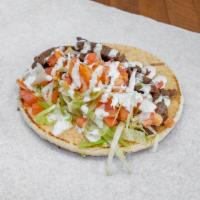 Gyro Wrap · Traditional lamb and beef gyro wrapped in pita bread along with your choice of 3 toppings.