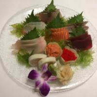 Sashimi Entree · 14 pieces of sashimi with a kani cucumber wrap.