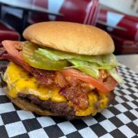 Bacon and Cheese Classic Burger · Large. Hamburger topped with cheese and bacon.