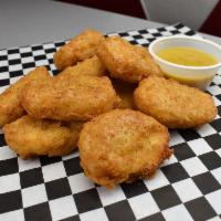 #6 Chicken Nuggets Combo · Breaded or battered crispy chicken.