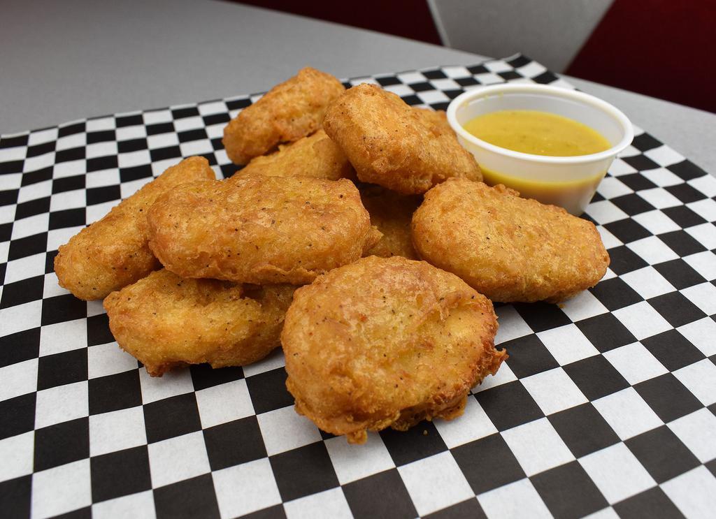 Chicken Nuggets · Breaded or battered crispy chicken.
