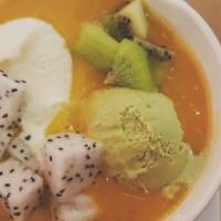 Ice Cream Mario · A scoop of matcha and vanilla ice cream topped with fresh dragonfruit and kiwi, served with ...