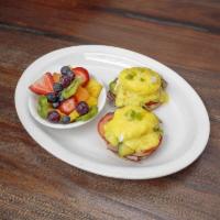 Ham, Avocado and Tomato Benedict · Prepared with mustard hollandaise sauce served on an English muffin.