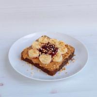 Peanut Butter and Jelly Tartine (VG) · Strawberry chia jam, natural peanut butter, banana on multigrain. Vegan.