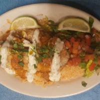 GRILLED TILAPIA  MEXICAN STYLE. ''PLATTER'' · Grilled tilapia fish served with Mexican rice over  spice salsa,and salad. 