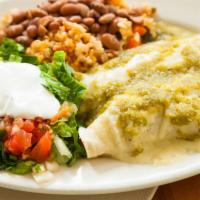 Cheese Enchilada · Two soft corn tortillas with cheese and  rich tomatillo salsa and served with mexican rice,s...