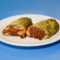 Chicken Mole Burrito · Mexican rice, pinto beans,  with rich  mole sauce,pico de gallo  and sour cream on a flourto...
