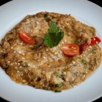 Eggplant Salad · Charcoal grilled eggplant, tomatoes, green and red peppers flavored. Served with garlic and ...