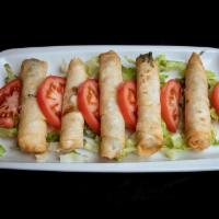 Cheese Roll · 5 pieces. Sigara boregi. Pan fried phyllo scrolls stuffed. Served with feta cheese, parsley,...