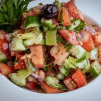 Shepherd Salad · Fresh tomatoes, cucumbers, green pepper, parsley and onion.