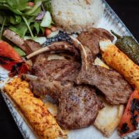 Lamb Chops · Grilled tender Lamb chops. Served with rice and house salad 