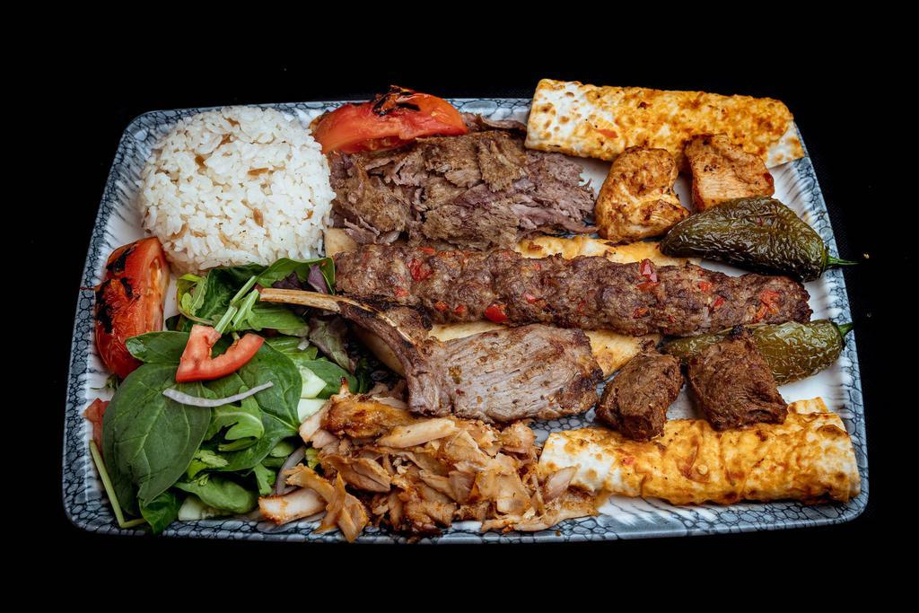 Mixed Grill · Gyro, shish kebab, chicken shish kebab, lamb chops and adana kebab. Served with rice and coleslaw.