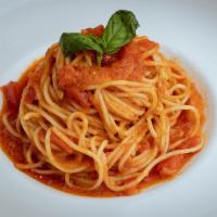 Spaghetti Napolitana · Spaghetti, Napolitana sauce, basil and Parmesan cheese.