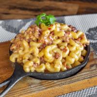 Chorizo Mac and Cheese · Fresh ground chorizo and elbow pasta in a creamy cheddar cheese baked to perfection and topp...