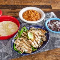 Chicken Fajita · with red bell peppers, sauteed onions, roasted garlic served with sofrito rice, black beans,...